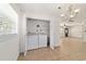 Convenient laundry area with washer, dryer, closet, and natural light at 5500 Se 2Nd Pl, Ocala, FL 34480