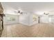 Spacious living area offers tile floors, ceiling fans, and abundant natural light at 5500 Se 2Nd Pl, Ocala, FL 34480