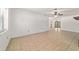 Open-concept living area boasts tile flooring, ample space, and backyard access at 5500 Se 2Nd Pl, Ocala, FL 34480