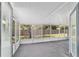 Enclosed back porch with a screened view of the backyard at 5500 Se 2Nd Pl, Ocala, FL 34480