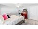 Cozy bedroom featuring a ceiling fan, wood-look flooring, and comfortable furnishings at 6 Sequoia Loop, Ocklawaha, FL 32179