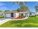 Beautiful one-story home featuring a well-manicured lawn and charming curb appeal at 6113 Sw 101St Pl, Ocala, FL 34476