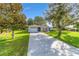 Charming single-story home with well-maintained lawn and inviting curb appeal on a sunny day at 6113 Sw 101St Pl, Ocala, FL 34476