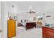 Spacious main bedroom with carpet, ceiling fan, and ample natural light at 6113 Sw 101St Pl, Ocala, FL 34476