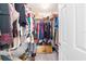 Walk-in closet with an abundance of storage space for clothes and accessories at 6113 Sw 101St Pl, Ocala, FL 34476
