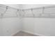 Empty walk-in closet with metal shelving at 7067 Sw 60Th Ln, Ocala, FL 34474