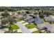 Beautiful neighborhood view featuring tree lined streets and gorgeous lawns in the area at 7243 Se 172Nd Legacy Ln, The Villages, FL 32162