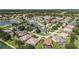 Overhead view captures homes with screened patios and manicured lawns in this active residential neighborhood at 7243 Se 172Nd Legacy Ln, The Villages, FL 32162