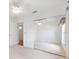 Bedroom with mirrored closet doors, ceiling fan, and natural light at 7243 Se 172Nd Legacy Ln, The Villages, FL 32162