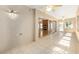 Open sunroom with fireplace view from the large sliding glass doors at 7243 Se 172Nd Legacy Ln, The Villages, FL 32162