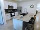 Well-appointed kitchen featuring stainless steel appliances, granite countertops, and ample cabinet space for storage at 80 Hickory Course Loop, Ocala, FL 34472