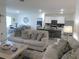 Open-concept living space showcasing a seamless transition between the living, dining, and kitchen areas, great for entertaining at 80 Hickory Course Loop, Ocala, FL 34472