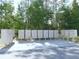 Community mailboxes stand ready amongst mature trees, offering convenient access for residents in this quiet neighborhood at 80 Hickory Course Loop, Ocala, FL 34472