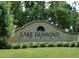 Community sign for Lake Diamond, enhanced by vibrant green landscaping at 80 Hickory Course Loop, Ocala, FL 34472