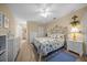 Inviting bedroom with a nautical theme, plenty of storage, and wood-look flooring at 8461 Sw 109Th St, Ocala, FL 34481