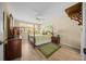 Tranquil bedroom featuring a four-poster bed and peaceful decor at 8461 Sw 109Th St, Ocala, FL 34481