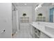 Bathroom with double vanity and walk-in shower at 8775 Sw 192 Ct, Dunnellon, FL 34432