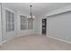 Formal dining room with natural light, perfect for entertaining and Gathering dinners at 8775 Sw 192 Ct, Dunnellon, FL 34432