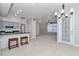 Modern kitchen with stainless steel appliances and a breakfast bar open to the living space at 8775 Sw 192 Ct, Dunnellon, FL 34432