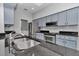 Updated kitchen with granite countertops and stainless steel appliances at 8775 Sw 192 Ct, Dunnellon, FL 34432
