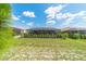 Expansive backyard showcasing the privacy screen and fully screened-in patio at 8913 Sw 76Th Ln, Ocala, FL 34481