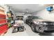 Spacious two-car garage with epoxy flooring and ample storage space at 8913 Sw 76Th Ln, Ocala, FL 34481