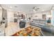 Spacious living area with an open layout, connecting the kitchen and living room at 8913 Sw 76Th Ln, Ocala, FL 34481
