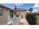 Outdoor patio with dining set, perfect for al fresco dining and relaxing at 9047 Sw 102Nd Cir, Ocala, FL 34481