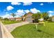 Lovely single-story house boasting a brick driveway, manicured lawn, and a spacious attached two car garage at 9120 Se 125Th Loop, Summerfield, FL 34491
