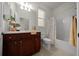 Bathroom featuring vanity, mirror, and shower/tub combo at 9948 Sw 69Th Ln, Ocala, FL 34481