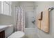 Bathroom featuring shower and tub combo with towels at 9948 Sw 69Th Ln, Ocala, FL 34481