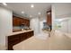 Eat-in kitchen with stainless steel appliances, wood cabinets, and tile flooring at 9948 Sw 69Th Ln, Ocala, FL 34481
