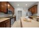 Kitchen featuring stainless steel appliances, pantry, and center island at 9948 Sw 69Th Ln, Ocala, FL 34481