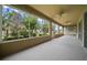 Large enclosed lanai offering serene views of the beautifully landscaped backyard at 9948 Sw 69Th Ln, Ocala, FL 34481