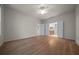 Spacious main bedroom with ensuite bathroom access and hardwood flooring at 9948 Sw 69Th Ln, Ocala, FL 34481