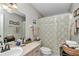 Bathroom featuring a vanity, sink, neutral decor, and a shower-tub combination at 10086 Sw 62Nd Terrace Rd, Ocala, FL 34476