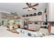 Open kitchen with a large sink, stainless steel appliances, and decor above cabinets with a breakfast nook at 10086 Sw 62Nd Terrace Rd, Ocala, FL 34476