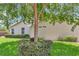 Charming home exterior featuring manicured landscaping and classic architectural details at 10819 Sw 84Th Ter, Ocala, FL 34481