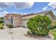 Single Gathering home with a two car garage and well maintained landscaping at 10819 Sw 84Th Ter, Ocala, FL 34481
