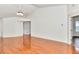Spacious living room with beautiful hardwood floors and vaulted ceilings; perfect for entertaining at 10819 Sw 84Th Ter, Ocala, FL 34481