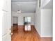 Inviting living room with high ceilings, lots of natural light, and gleaming hardwood floors at 10819 Sw 84Th Ter, Ocala, FL 34481