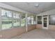 Enclosed lanai offers ample natural light, ceiling fan, and great outdoor views at 10819 Sw 84Th Ter, Ocala, FL 34481