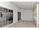 This screened in sunroom offers sliding doors and carpet floors at 10819 Sw 84Th Ter, Ocala, FL 34481