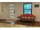 Bright living room featuring modern decor and ample natural light from the front window at 1245 Nw 73Rd Ter, Ocala, FL 34482