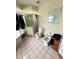 A secondary bathroom offering a shower, toilet, bidet and tile floors at 13506 Sw 43Rd Cir, Ocala, FL 34473