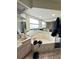 Relax in this bathroom featuring a standalone soaking tub, vanity and large mirror at 13506 Sw 43Rd Cir, Ocala, FL 34473