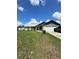 Charming single-story home featuring a well-manicured lawn and an attached two-car garage at 13506 Sw 43Rd Cir, Ocala, FL 34473