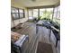 Enclosed patio with tile flooring, perfect for relaxing or entertaining guests at 13506 Sw 43Rd Cir, Ocala, FL 34473