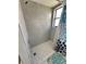 Updated shower featuring modern tile work at 13506 Sw 43Rd Cir, Ocala, FL 34473