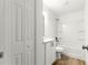 Bathroom featuring tiled floors, a granite vanity, a shower and a closet at 14876 Se 34Th Ter, Summerfield, FL 34491